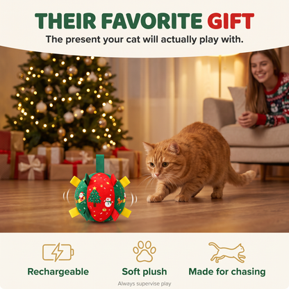 Orange tabby cat about to pounce on the SantaClaws Christmas cat ball in a living room with a Christmas tree